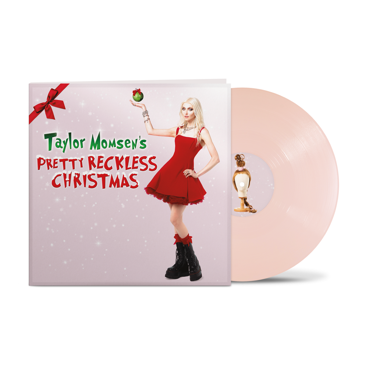 Vinyl record with album cover featuring Taylor Momsen in red dress.