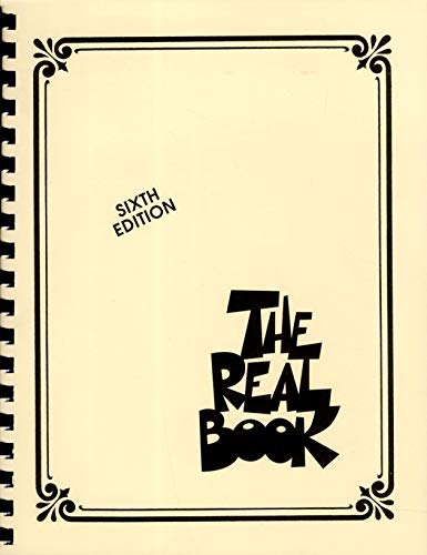 Spiral-bound music book cover titled The Real Book with Sixth Edition text.