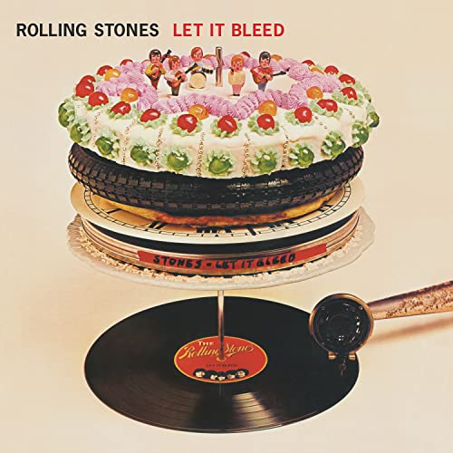 The Rolling Stones’ “Let It Bleed” album cover: cake with tires and figures.