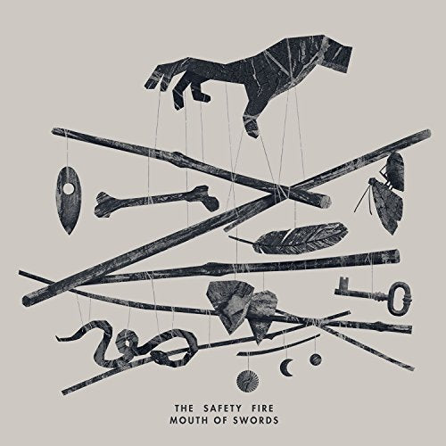 The image depicts a marionette with various objects, representing the album "Mouth of Swords".