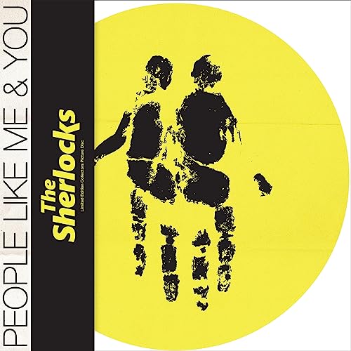 Yellow vinyl record with black silhouettes of two figures embracing.