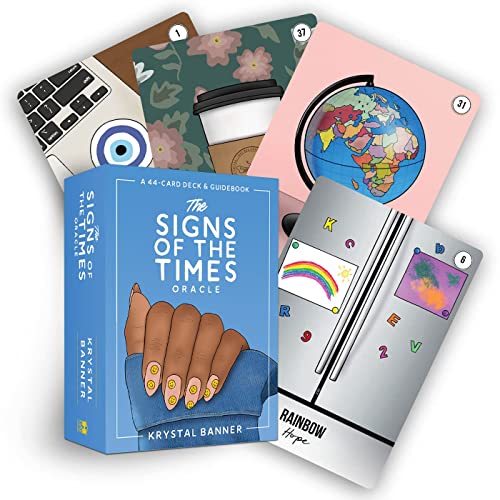 Oracle card deck and guidebook with modern, symbolic imagery displayed.