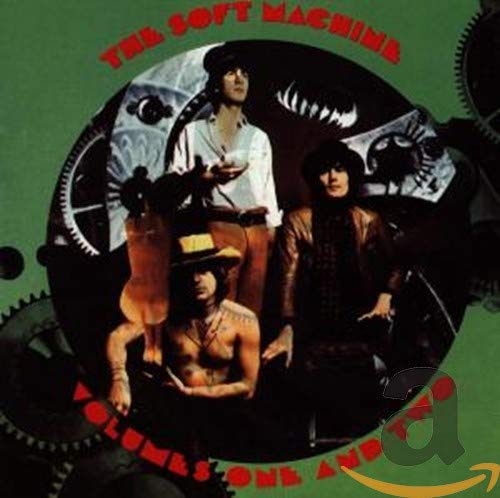 Album cover for The Soft Machine, featuring musicians in a surreal, mechanical design.