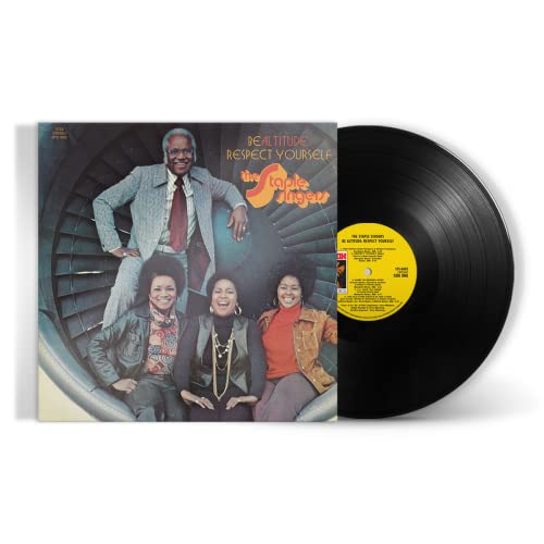 Vinyl record and cover with four people on a spiral staircase.