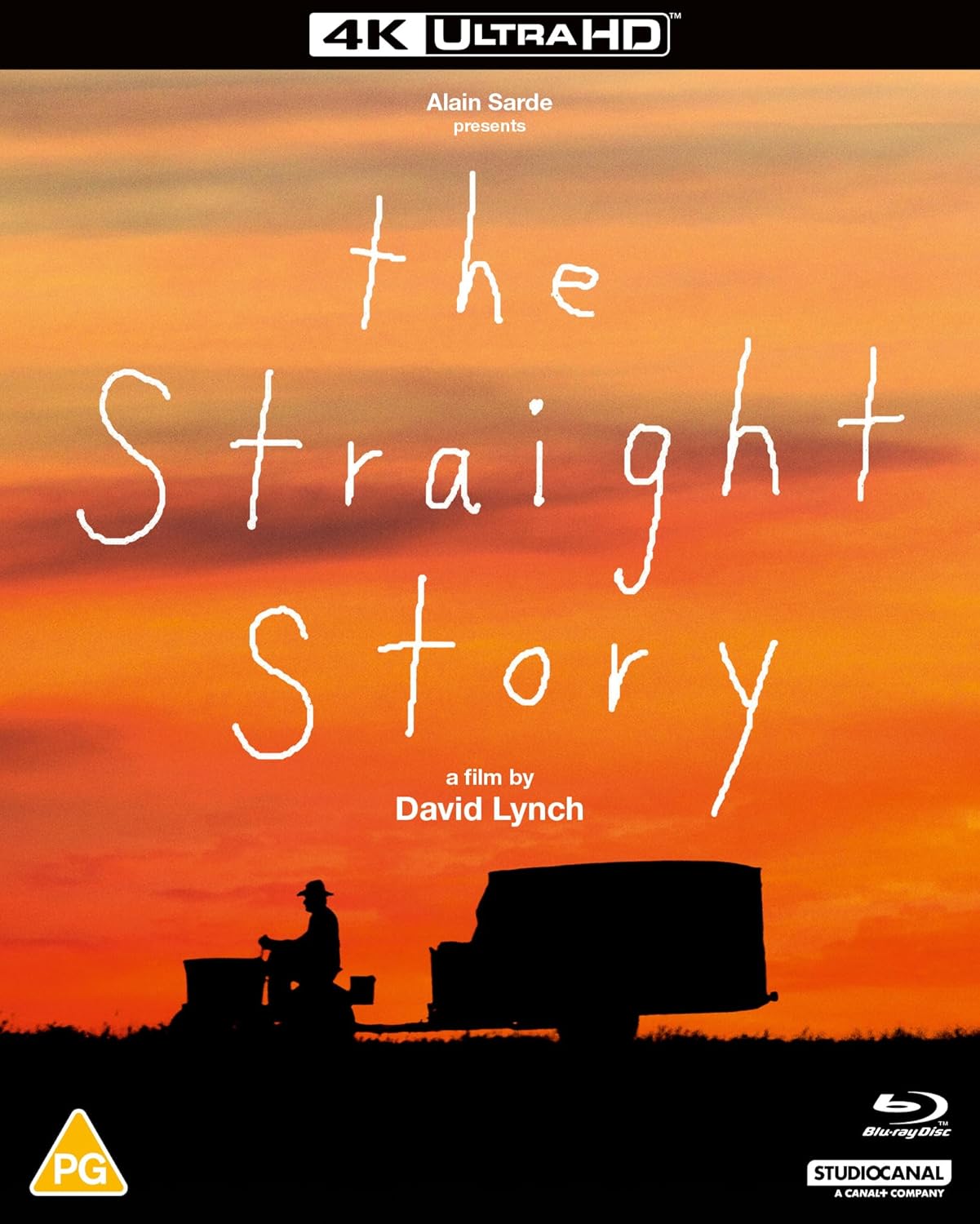“The Straight Story” Blu-ray cover with silhouette of man and tractor at sunset.