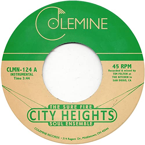 Green and tan 7-inch vinyl record label with text and central hole.