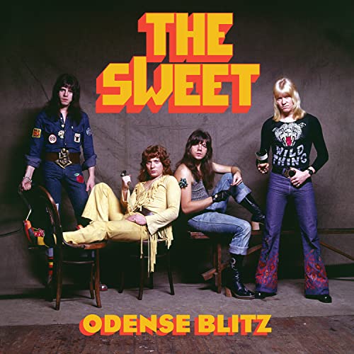The Sweet band members pose for album cover, "Odense Blitz" vinyl record.