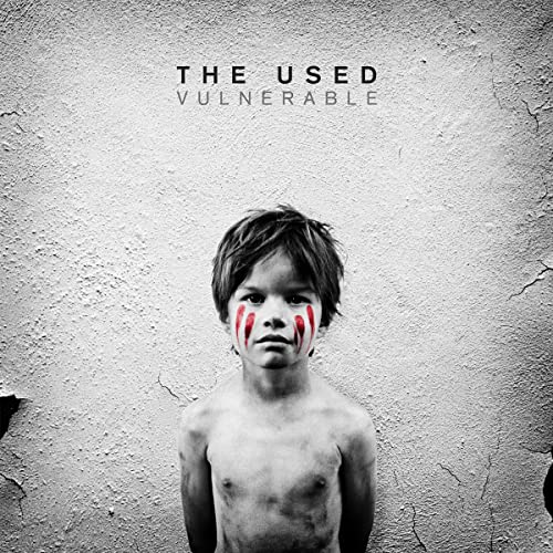 Album cover for The Used’s “Vulnerable” featuring a boy with face paint.