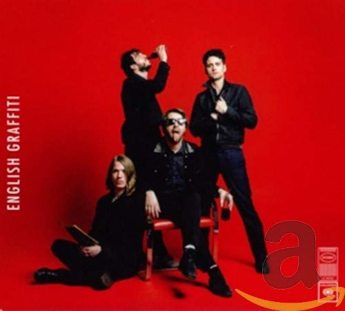 The Vaccines band portrait on a red background, album cover art.