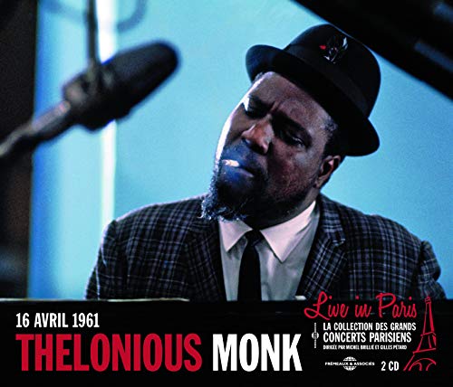 Thelonious Monk in a hat playing piano, album cover for "Live in Paris 1961.