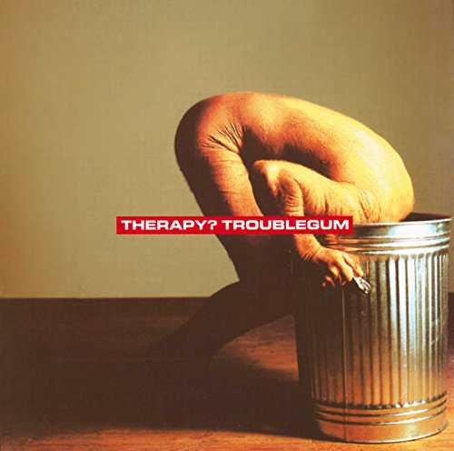 Album cover: person curled in a trashcan, red text "THERAPY? TROUBLEGUM".