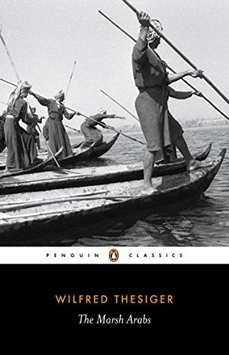 Book cover depicting people in boats amongst marshlands, “The Marsh Arabs.”