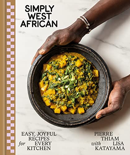 Cookbook cover featuring a bowl of stew held by dark-skinned hands.