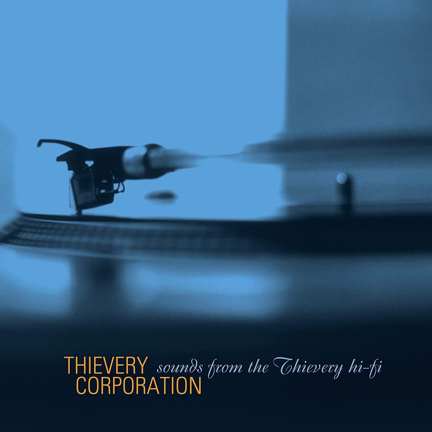 "CD case cover featuring a record player needle on a blue-toned background."