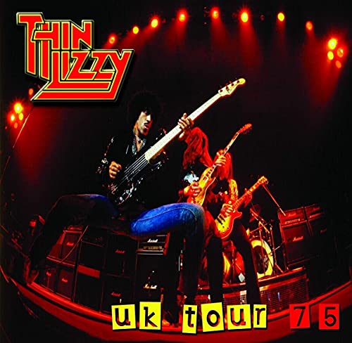Thin Lizzy album cover featuring band members performing on stage.