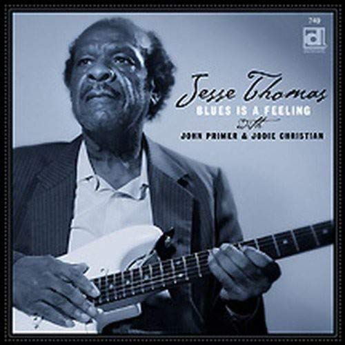 CD cover featuring Jesse Thomas with a guitar, titled "Blues Is A Feeling".