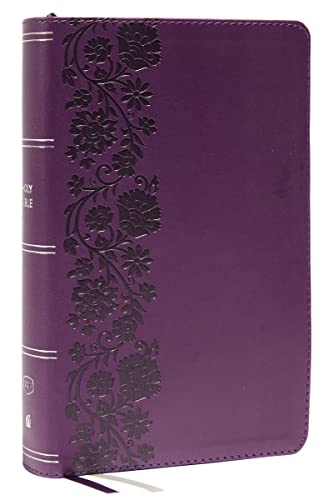 Purple leather Bible with embossed floral design and gilded page edges.