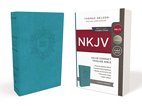 Blue NKJV Bible with gold detailing, shown with its packaging.