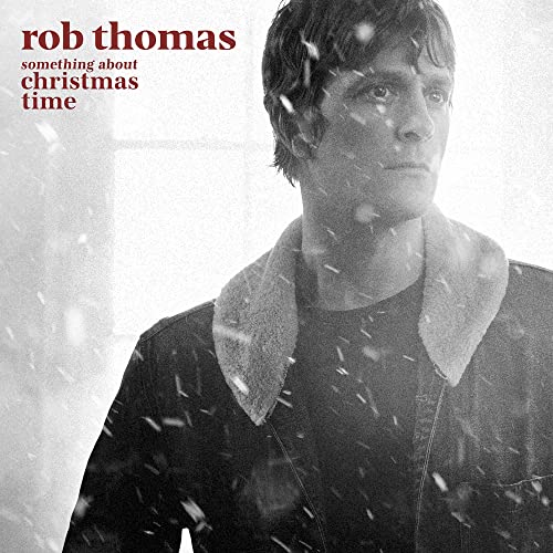 Black and white album cover featuring Rob Thomas with falling snow.
