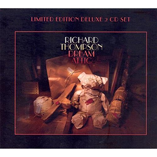 "Album cover featuring a teddy bear made from wrapped packages in a dimly lit attic."