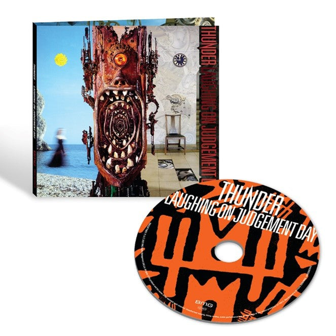 "CD case and disc with abstract artwork and 'Thunder - Laughing On Judgement Day' text."