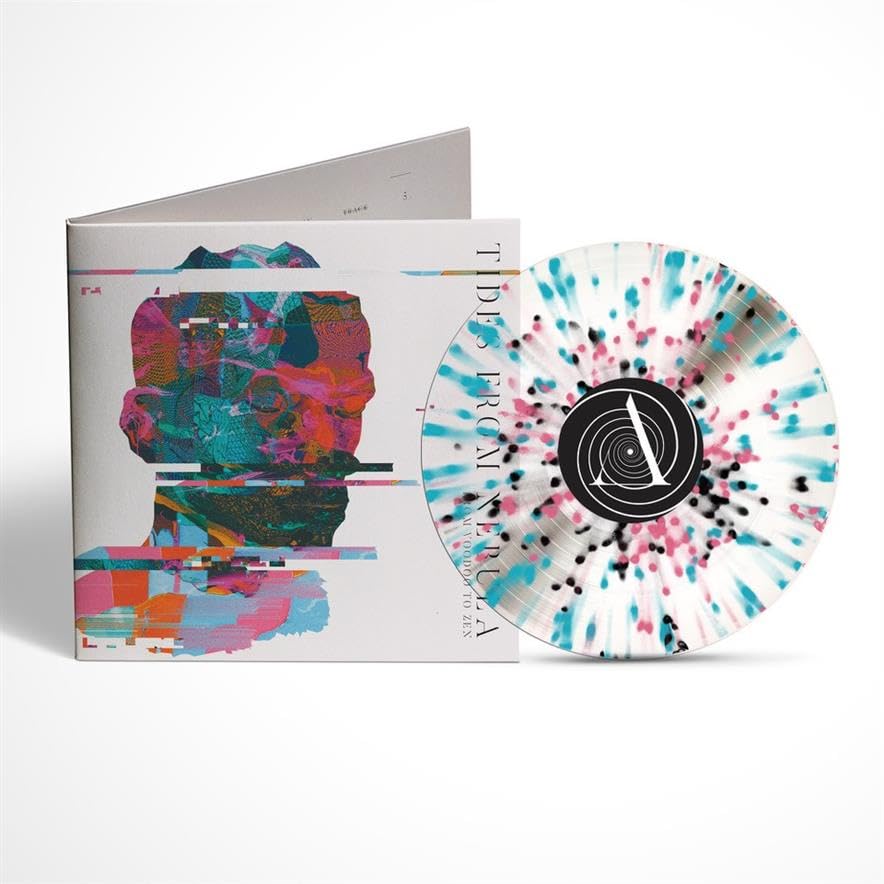 Vinyl record with colorful splatter pattern and abstract face artwork.