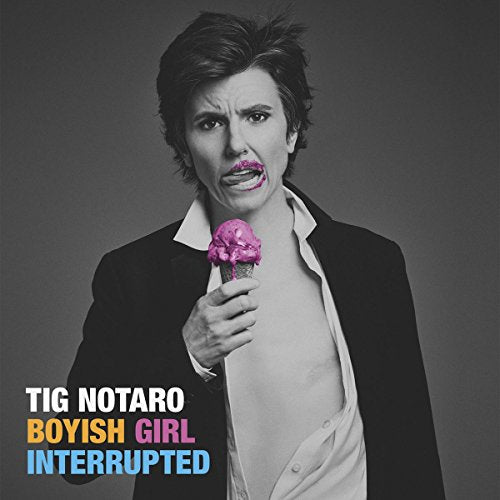 Tig Notaro in a suit jacket holding a pink ice cream cone.