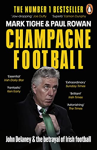 Book cover featuring John Delaney, titled "Champagne Football," with reviews.