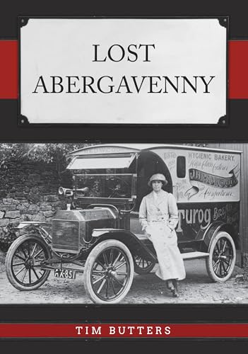 Vintage photograph of a woman and early automobile in Abergavenny.