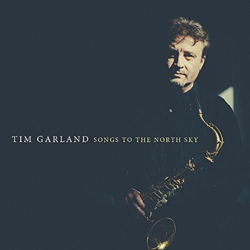 Tim Garland album cover featuring a man with a saxophone.