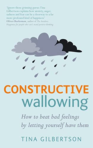 Book cover with dark clouds, orange title: "Constructive Wallowing" by Tina Gilbertson.