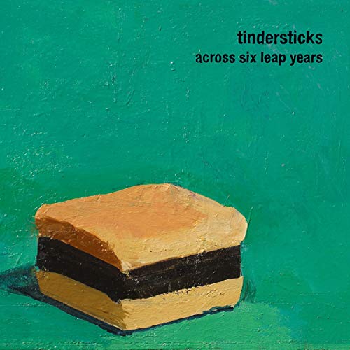 Album cover: painted sandwich on green, with text “tindersticks across six leap years”.