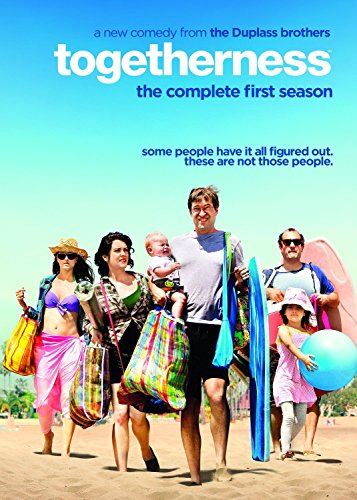DVD cover showing a family walking on a beach carrying bags and beach gear.