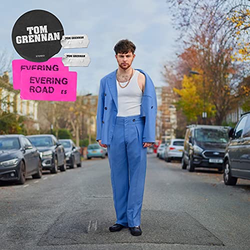 Album cover for Tom Grennan’s “Evering Road” featuring the artist in blue attire.