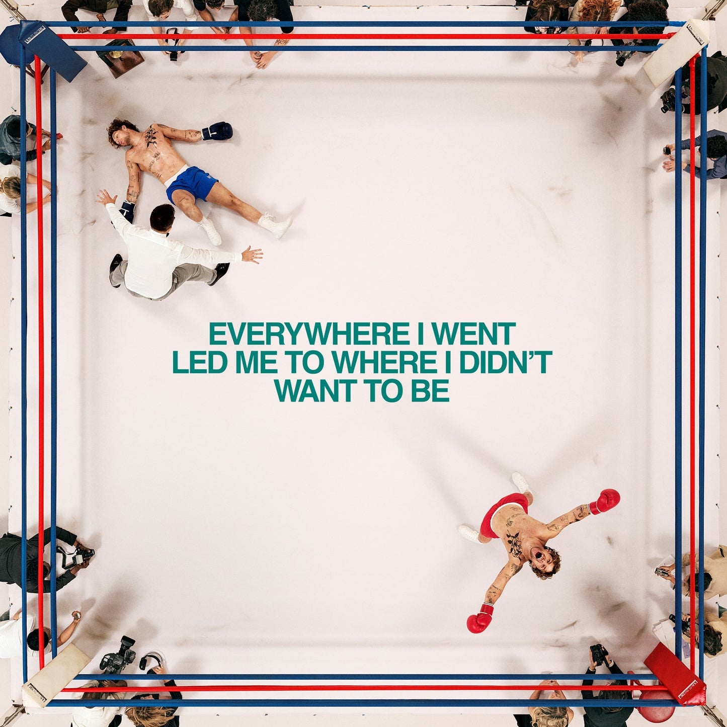 Tom Grennan album cover: man in boxing ring, others fallen around him.