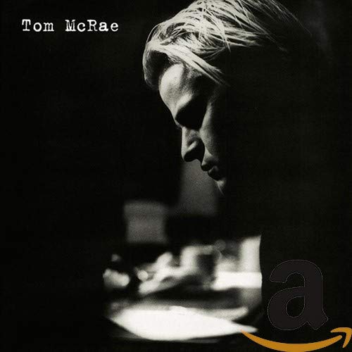 Black and white album cover featuring a portrait of Tom McRae.