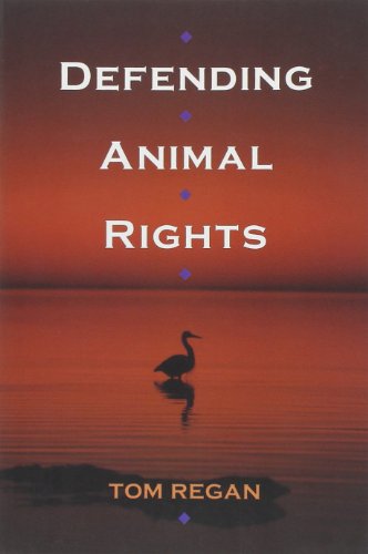 Book cover: "Defending Animal Rights" with a pelican on water.