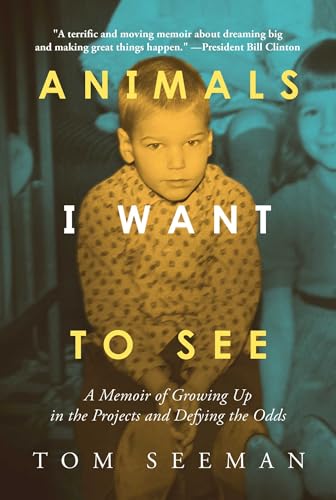Book cover featuring a young boy, with bold yellow text: "Animals I Want To See".