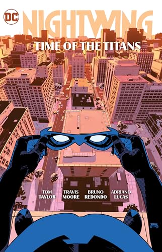 Nightwing comic cover: hands holding blue mask over a city view.
