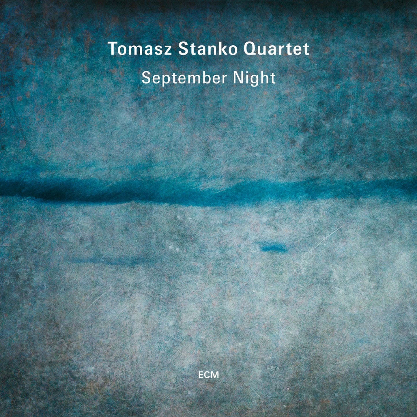 Tomasz Stanko Quartet “September Night” vinyl album cover, abstract blue tones.