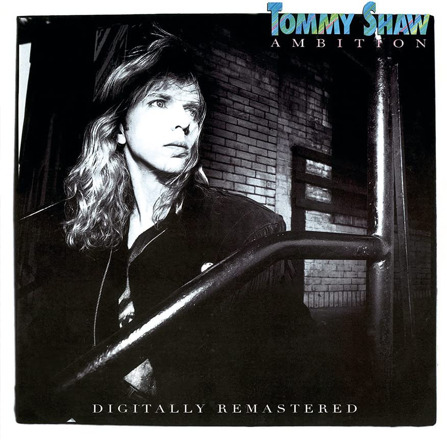 Tommy Shaw album cover, black and white portrait with brick background.