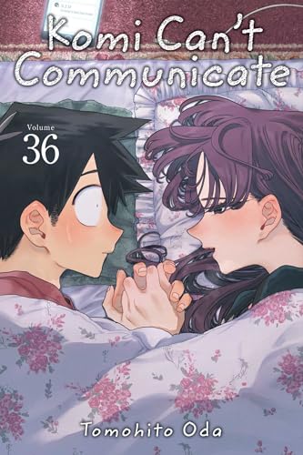 Manga cover showing two characters lying in bed holding hands, facing each other.