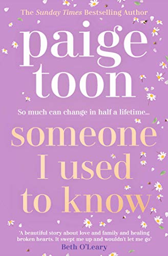 Book cover with purple background, white floral details, and bold title text.