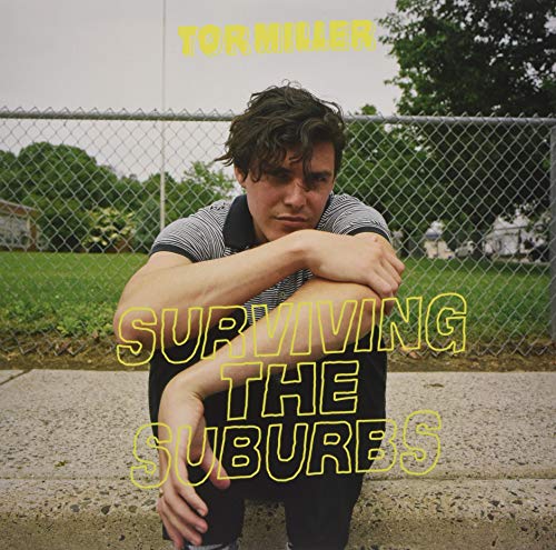 "Album cover with a man sitting by a chain-link fence, text overlay."