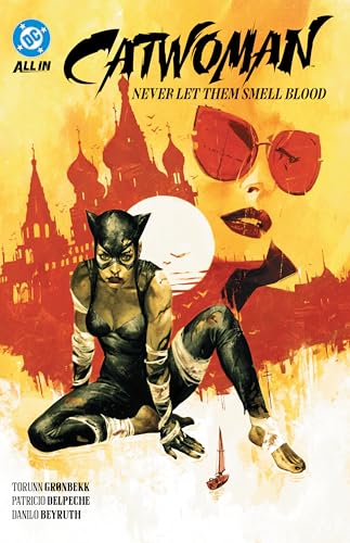 Catwoman comic cover featuring a seated figure with cat ears and red glasses.