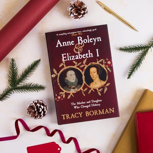 The book Anne Boleyn & Elizabeth I by Tracy Borman surrounded by holiday decorations.