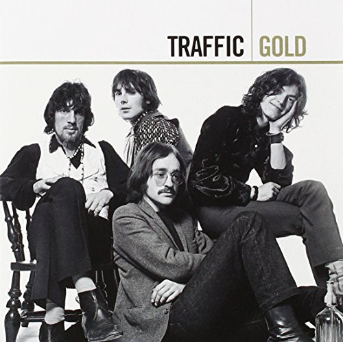 Black and white photo of four men, album cover for Traffic Gold CD.