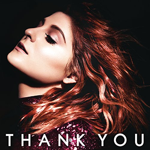 Alt text: "CD cover of 'Thank You' with woman in profile, red hair, dark background."