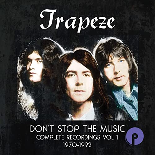 Album cover featuring three band members with long hair against a dark textured background.