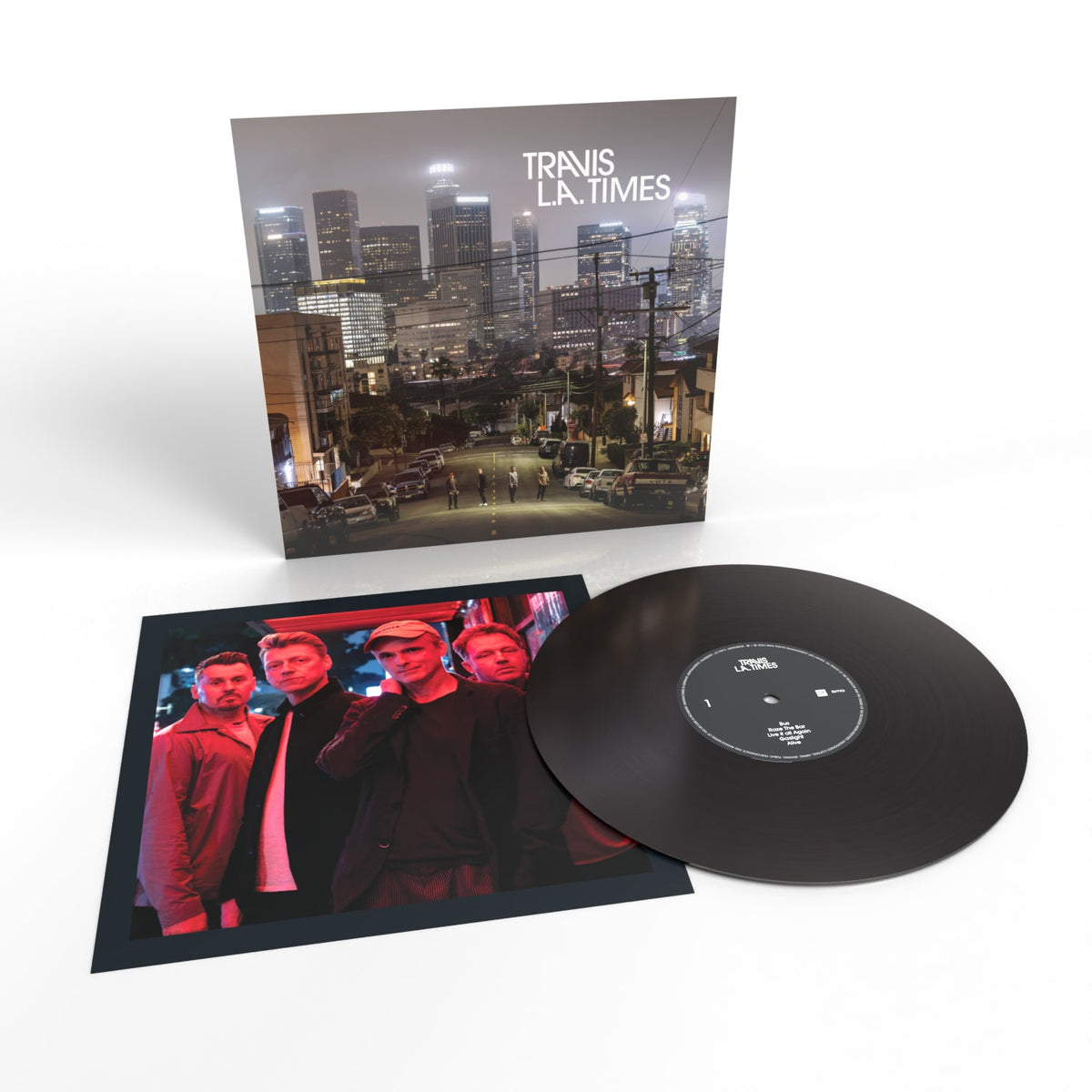 Travis “L.A. Times” vinyl record with album art and band photo.